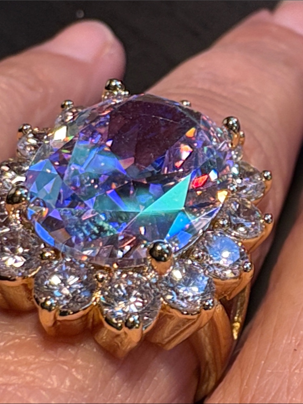 Kirks Folly Iridescent Multi-Color Oval Halo Ring in Gold